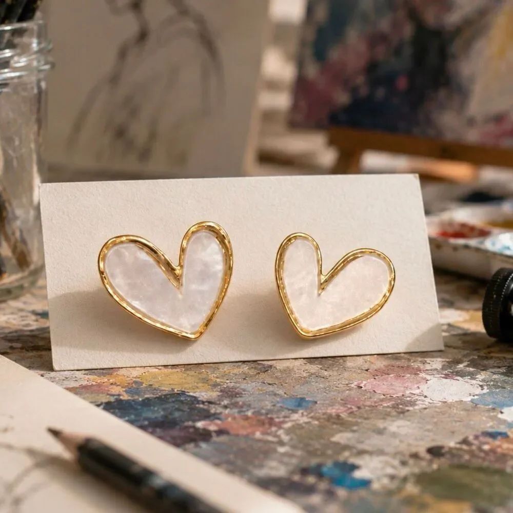 Asymmetrical Iridescent White Heart Stud Earrings